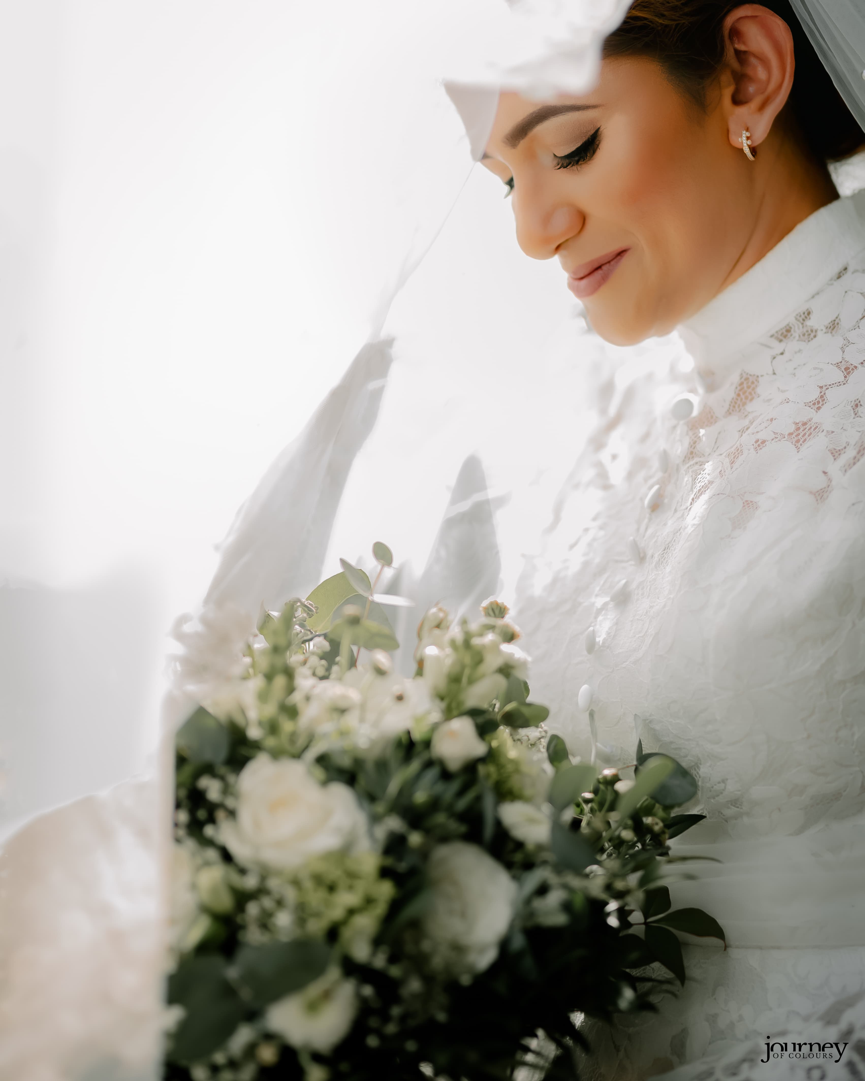 Portrait of a bride in elegant wedding attire