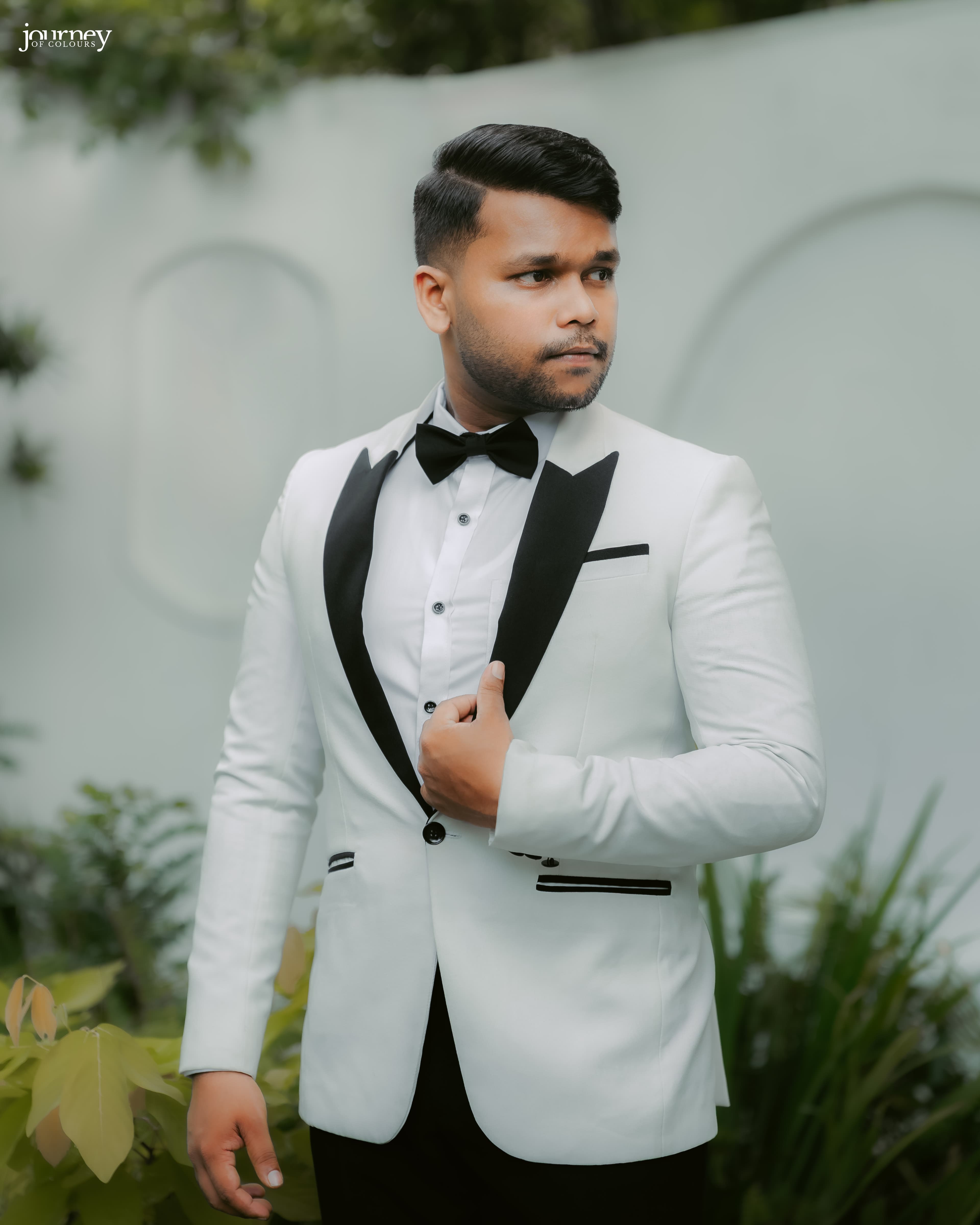 Portrait of the groom in formal wedding attire