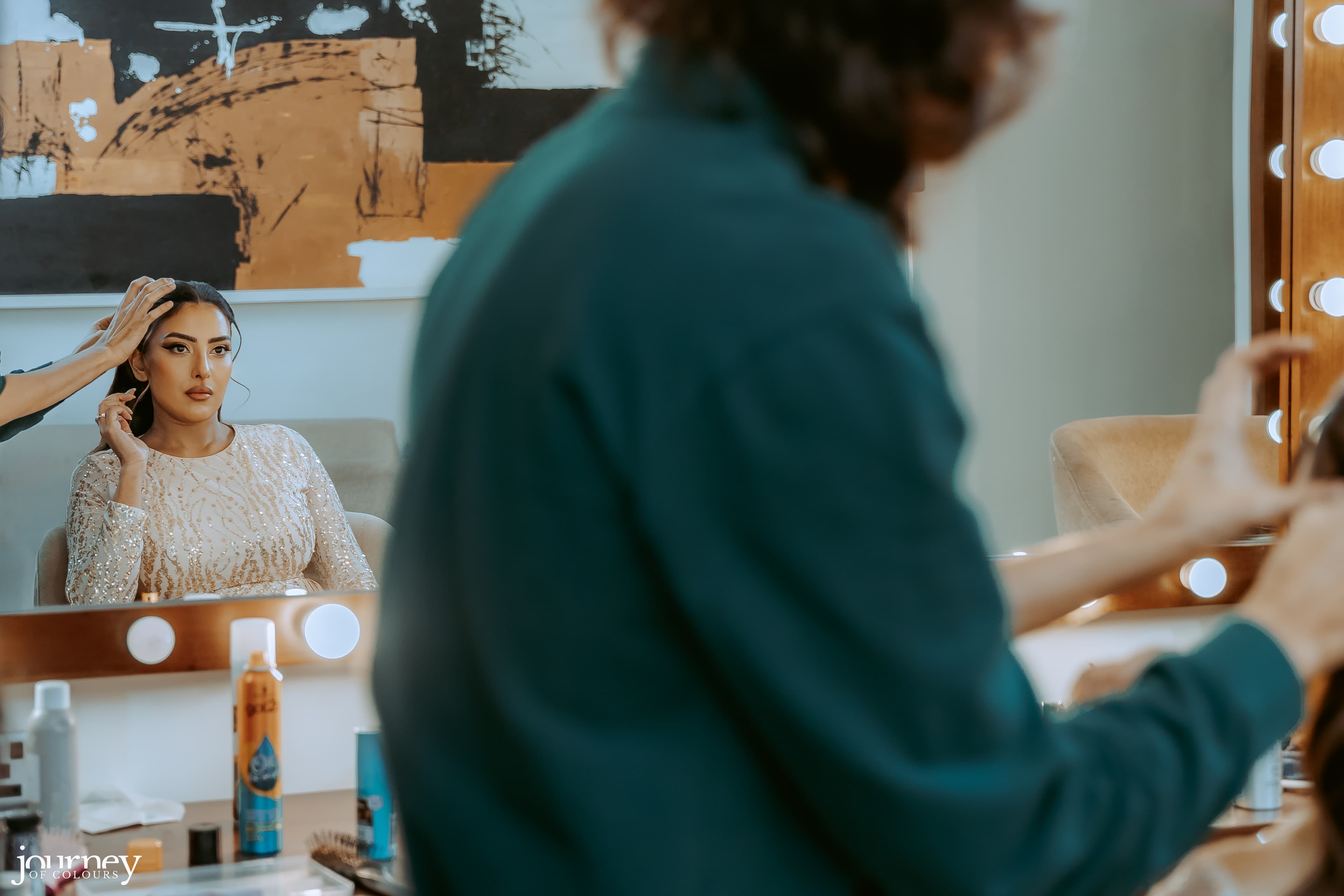Reflection of a bride during the final stages of wedding preparation